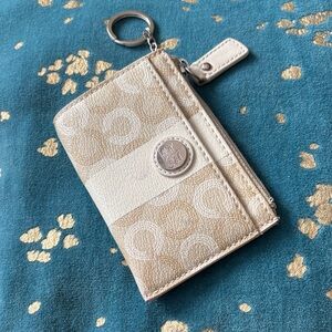 Coach Beige Monogram Pouch with White Trim and Silver Medallion